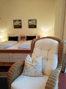 Postel nebo postele na pokoji v ubytování Hotel Garni Friesenhuus
