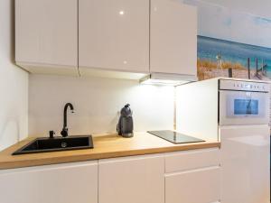 Kuchyňa alebo kuchynka v ubytovaní Solmare Apartments