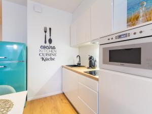 Kuchyňa alebo kuchynka v ubytovaní Solmare Apartments