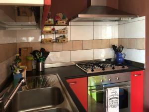Kjøkken eller kjøkkenkrok på Celi Blu Appartamento