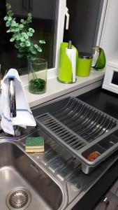 a kitchen sink with a grill on top of it at The Tushmore in Crawley