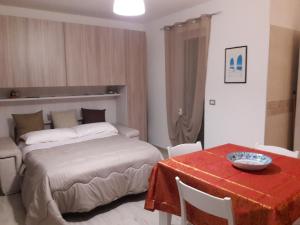 Ένα ή περισσότερα κρεβάτια σε δωμάτιο στο domar