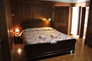 Postel nebo postele na pokoji v ubytování Da Rinota in Alta Val di Non