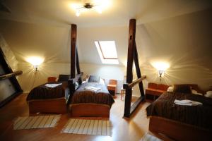 Posteľ alebo postele v izbe v ubytovaní Hotel Minaret&Étterem