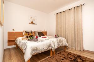 Katil atau katil-katil dalam bilik di Casa da Tenda