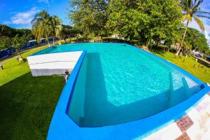 Bazén v ubytování ECO-CABAÑAS Cancún nebo v jeho okolí