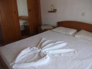 Postel nebo postele na pokoji v ubytování Delphin Apart Hotel