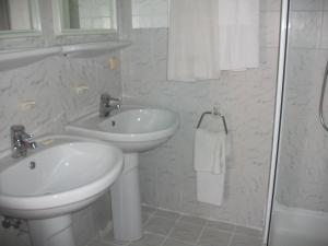 Koupelna v ubytování Delphin Apart Hotel