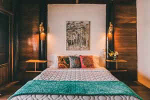 Ein Bett oder Betten in einem Zimmer der Unterkunft Cuna Luna Hosteria