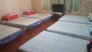 Postel nebo postele na pokoji v ubytování Dai Yi Shia B&B