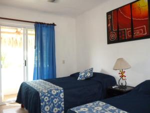 Katil atau katil-katil dalam bilik di Casa Marina Antonella