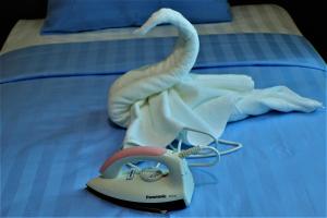 Letto o letti in una camera di Wave View Hotel