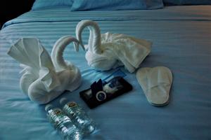Letto o letti in una camera di Wave View Hotel