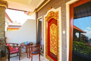 Balkón nebo terasa v ubytování Jungut Guest House Ubud