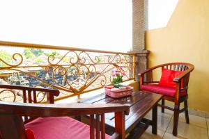 Balkón nebo terasa v ubytování Jungut Guest House Ubud
