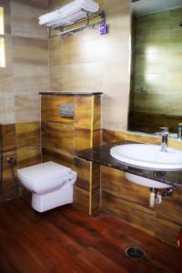 Ванная комната в Kabini Lake View Resort