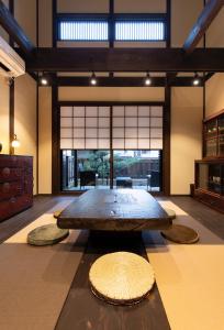 a large table in the middle of a room at Zaimoku-an in Kanazawa
