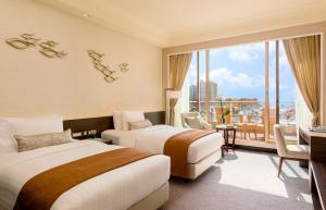 A bed or beds in a room at Hong Kong Gold Coast Hotel