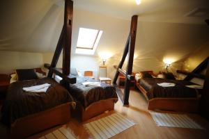 Posteľ alebo postele v izbe v ubytovaní Hotel Minaret&Étterem