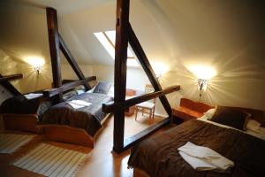 Posteľ alebo postele v izbe v ubytovaní Hotel Minaret&Étterem