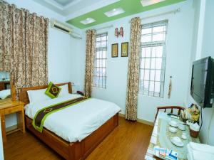 Voodi või voodid majutusasutuse Phuong Dong hotel toas