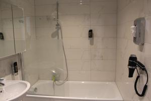 Koupelna v ubytování Hotel Lumi