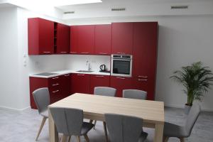 Kuchyň nebo kuchyňský kout v ubytování Hotel Lumi