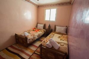 Кровать или кровати в номере Berber Family Lodge