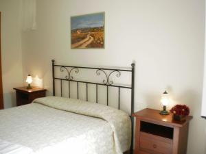 Voodi või voodid majutusasutuse Hotel Paese Corvara toas
