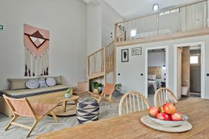 a living room with a table with apples on it at Kalimera Karpathos Exclusive Villas in Afiartis