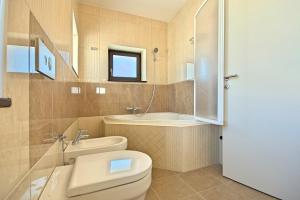 Kúpeľňa v ubytovaní Luxury Stone Villa Zanelli