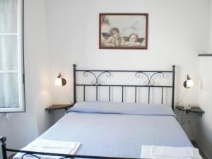Postel nebo postele na pokoji v ubytování Hotel Paese Corvara