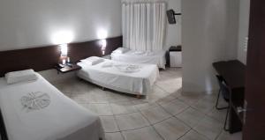 Ένα ή περισσότερα κρεβάτια σε δωμάτιο στο Bravo City Hotel Primavera +21 φωτογραφίες