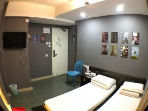 TV in/ali zabaviščno središče v nastanitvi Soso Hostel