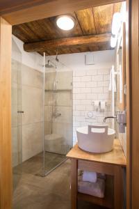 a bathroom with a sink and a shower at ANTIK in Štramberk