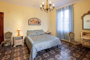 Postel nebo postele na pokoji v ubytování Villa Antiche Mura