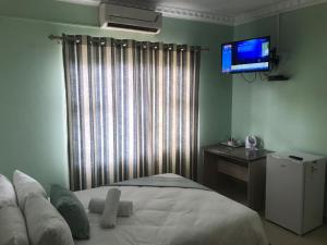 Ένα ή περισσότερα κρεβάτια σε δωμάτιο στο Sivande B&B