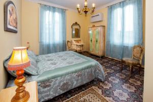 Postel nebo postele na pokoji v ubytování Villa Antiche Mura