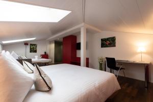 Postel nebo postele na pokoji v ubytování Hotel Spirgarten + 37 fotografií