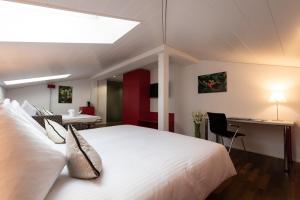 Säng eller sängar i ett rum på Best Western Hotel Spirgarten