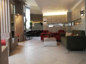 Area soggiorno di Hotel Montecarlo Santiago