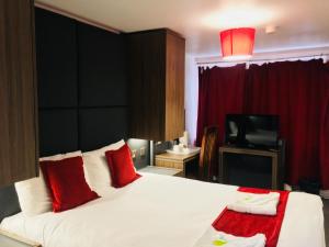 Postel nebo postele na pokoji v ubytování Hotel Express Newcastle Gateshead