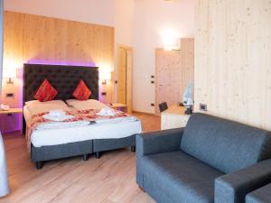Posteľ alebo postele v izbe v ubytovaní Hotel Almazzago