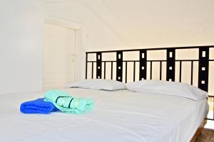 A bed or beds in a room at DISTRiCT 01 -Luxurious Villa with private beach