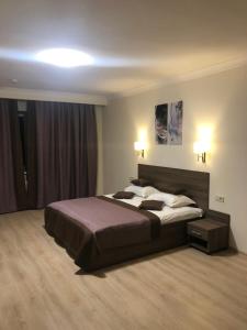 Ліжко або ліжка в номері Non-stop hotel
