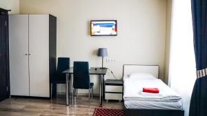 Postel nebo postele na pokoji v ubytování Bella Riga Hotel with Self-Check in