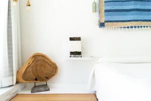 Postel nebo postele na pokoji v ubytování Hotel Muva Beach