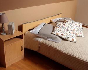 Кровать или кровати в номере Gîte de la Ferme de la Côte