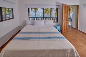 Кровать или кровати в номере Cabaña El Refugio