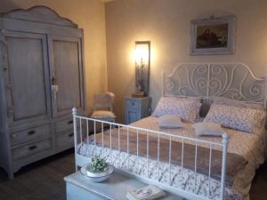 Postel nebo postele na pokoji v ubytování B&B Col di Piagge